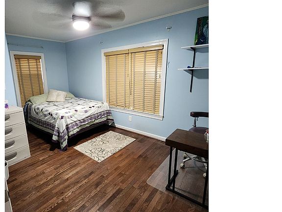 Bedroom 2 with closet, double bed, and space for your own desk and couch.