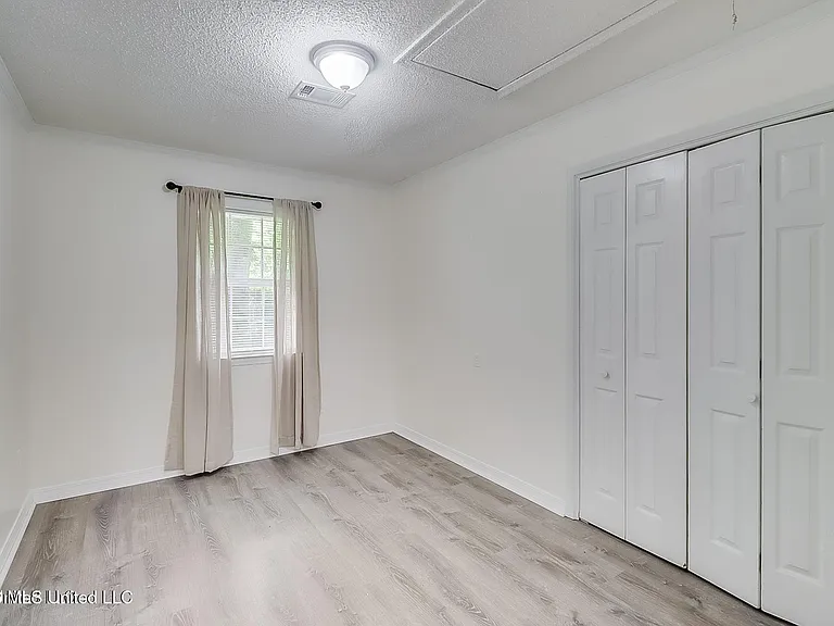 9228 Pointe Aux Chenes Rd — Photo 16