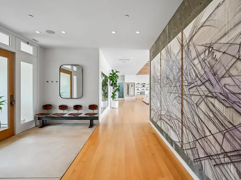 Featuring a modern interior design with clean lines and luxurious finishes.