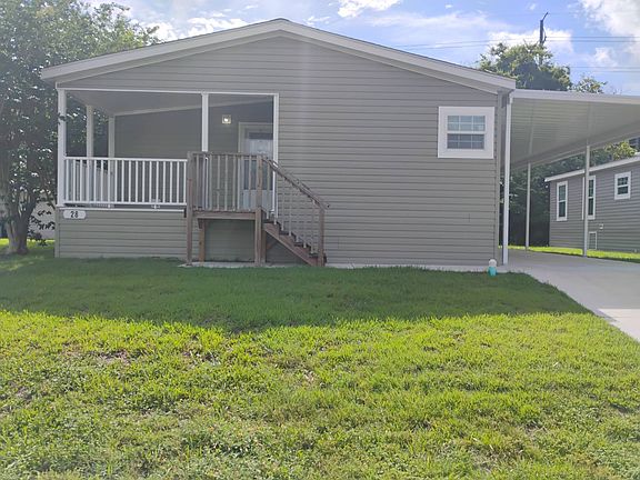 2nd image of 255 NW 40th Ave Lot 28