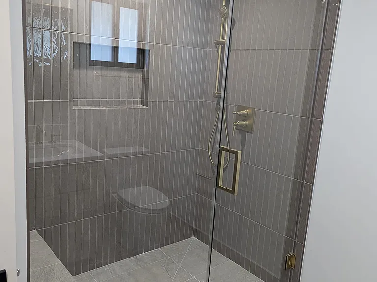 bathroom located in the 1st bedroom