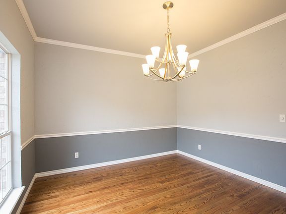 Another view of the large formal dining this could also be used as an office