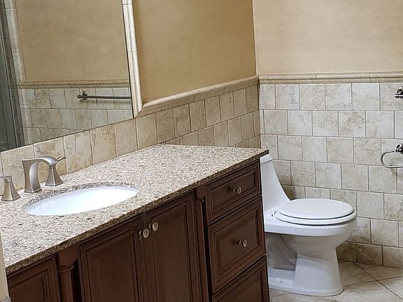 Large bathroom vanity with storage drawers