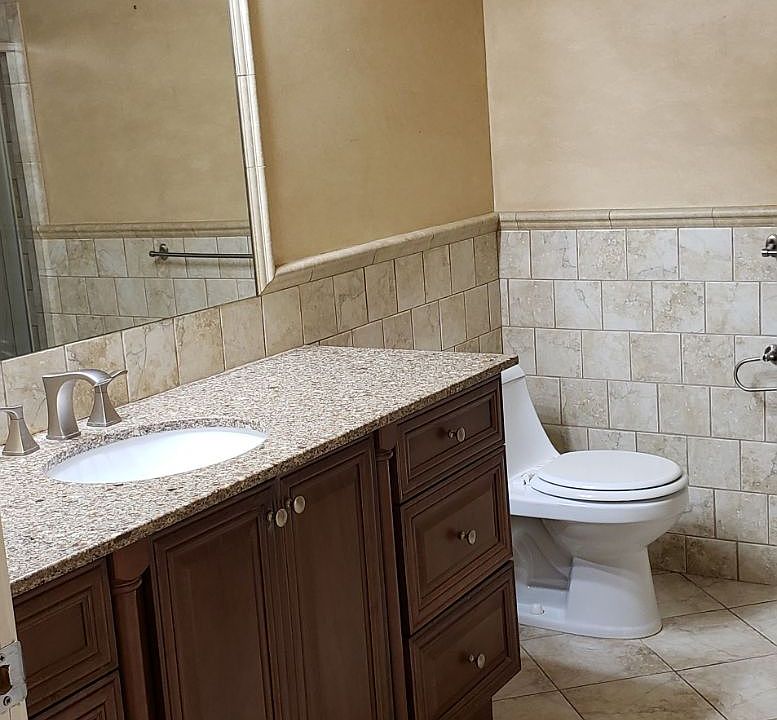 Large bathroom vanity with storage drawers