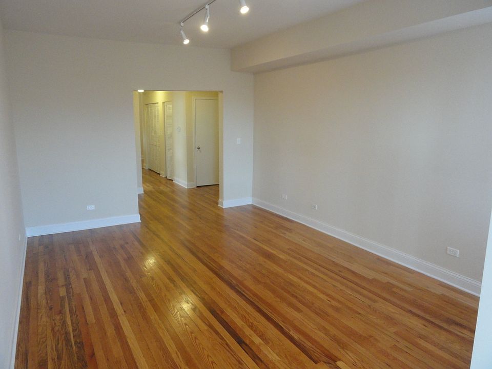 Large Living Room and Sun Room Space