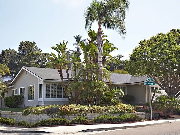 Corner lot with lush greenery