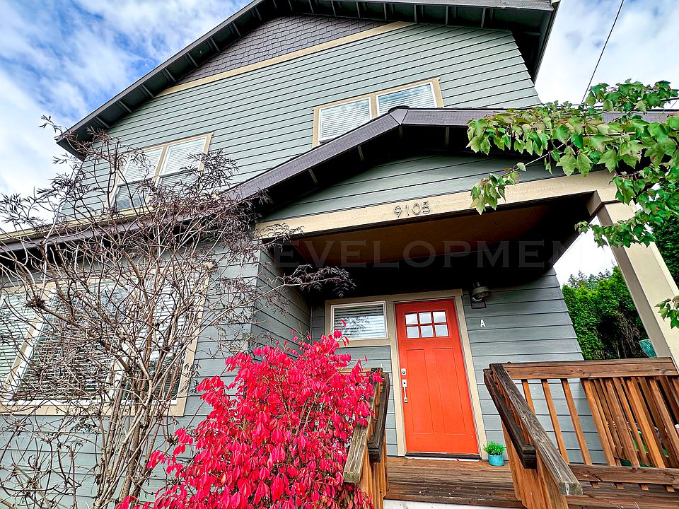 Front of house with bright fall landscaping