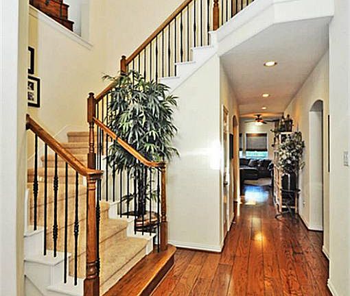 This exquisite home boasts Third Tier Upgraded El Paso 7' Wood flooring throughout the first floor i