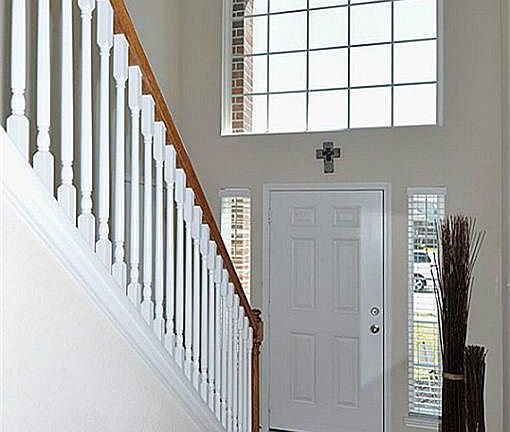 Light and bright two story entrance.