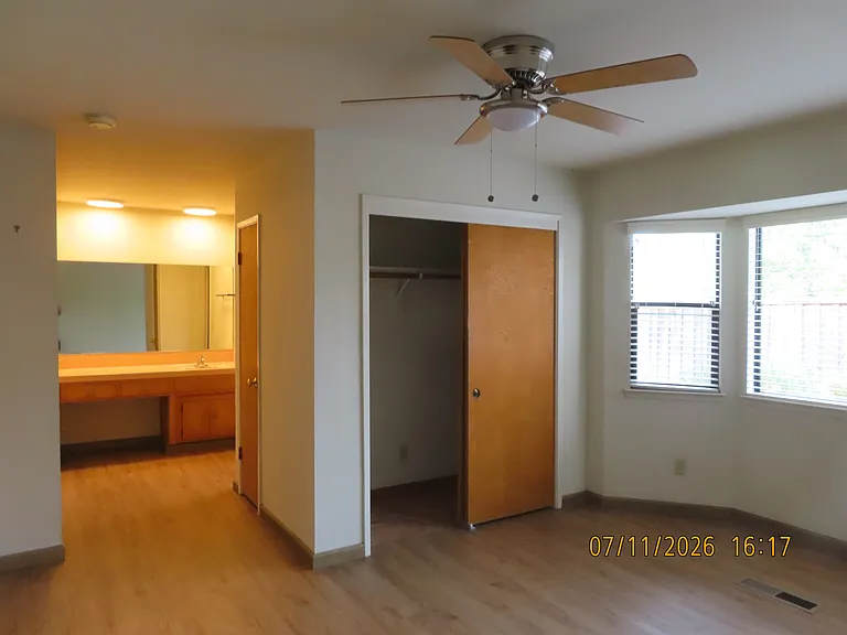 Master Bedroom with bay window and dressing area