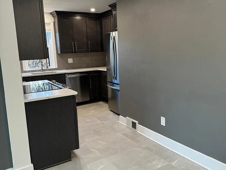 New cabinets with stainless steel appliances (including dishwasher)