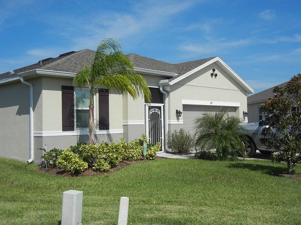 Front of house with double garage