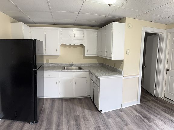 Kitchen - Looking at Bathroom and back door