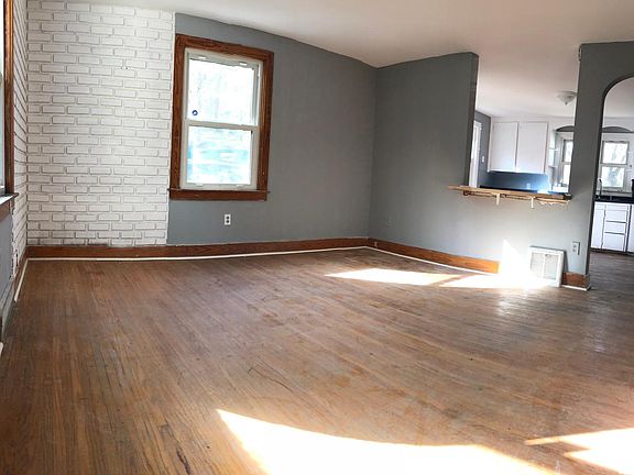 Living room with hardwood floors and new paint