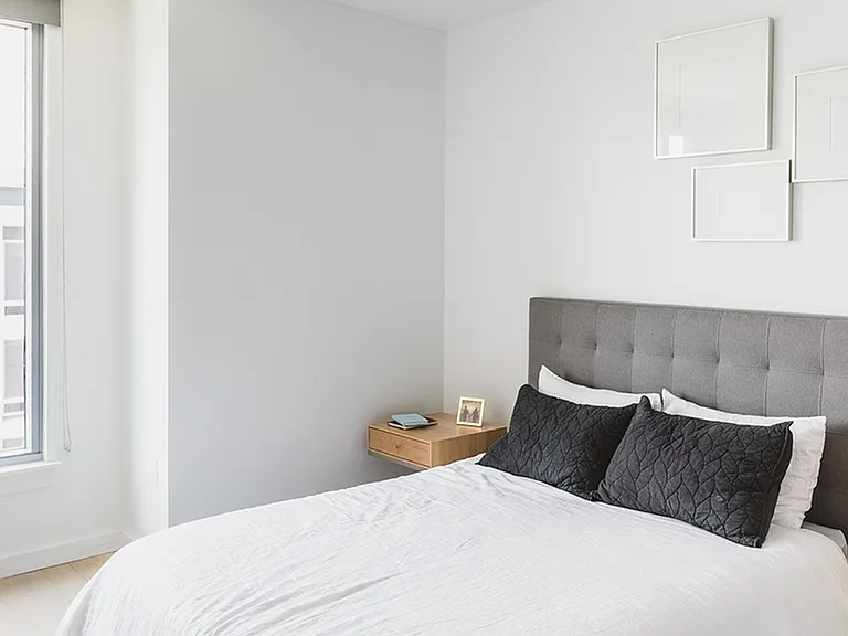 Brightly lit bedroom fit for a queen