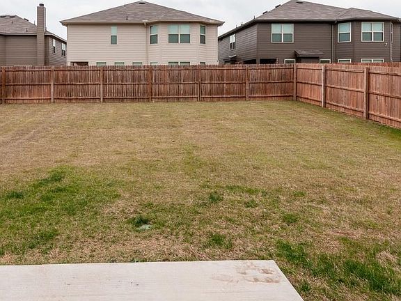 Pool sized back yard with open Patio