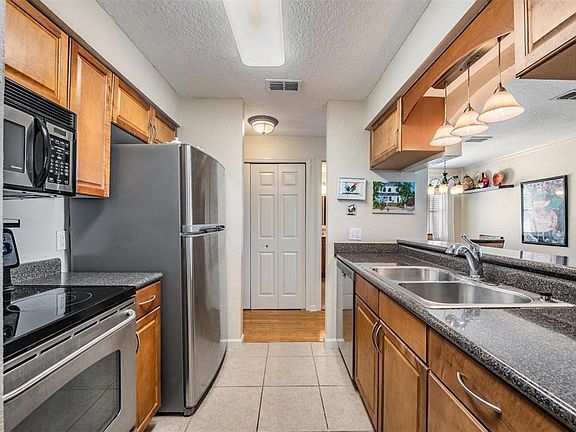 5th image of 10103 Sailwinds Blvd N APT 201