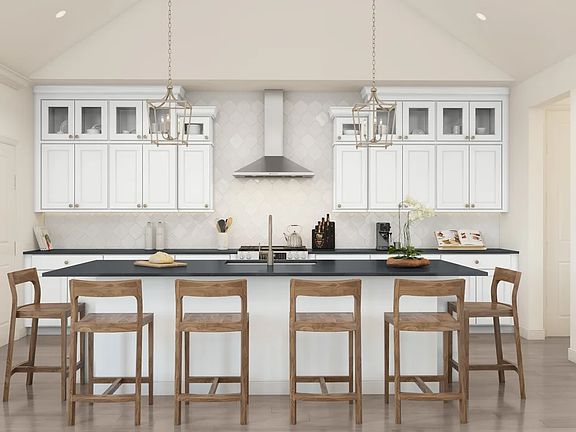 Kitchen with glass upper cabinets and pendant lighting