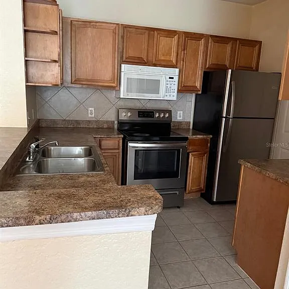 6141 Metrowest Blvd #106 — Photo 3