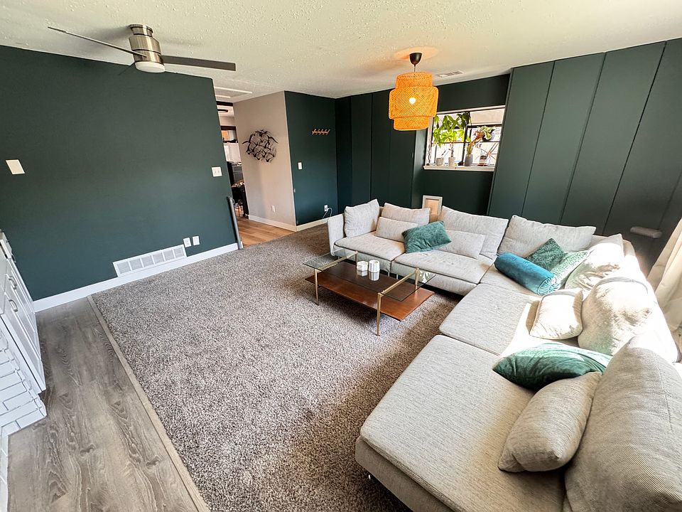 Living room with built in storage closets