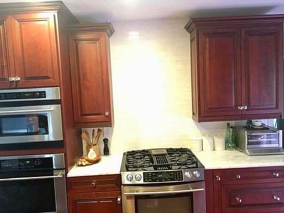 2 High end ovens; convection microwave; gas range; dishwasher