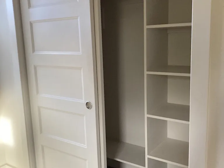 Bedroom closet with built in storage