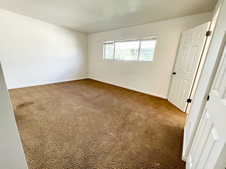 Spacious primary suite with half bath