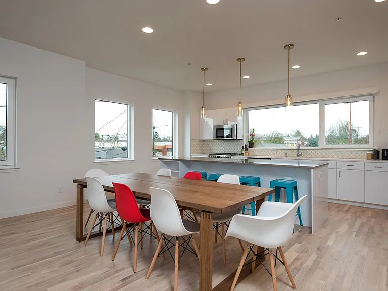 Kitchen & Dining with Modern Fixtures & Natural Lighting