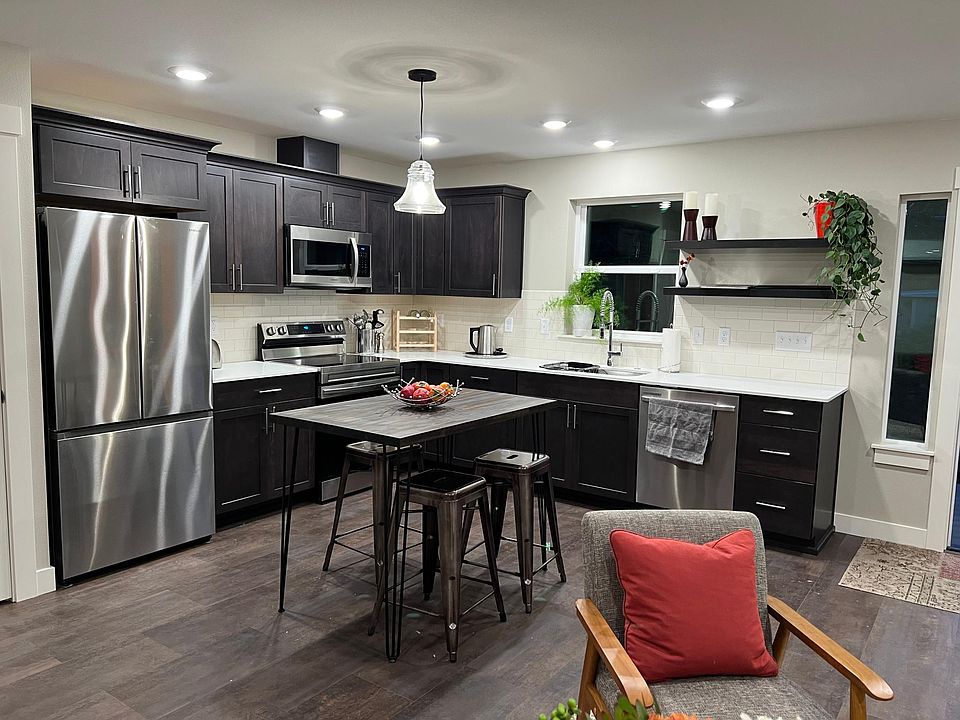Gorgeous kitchen with brand-new appliances and island.