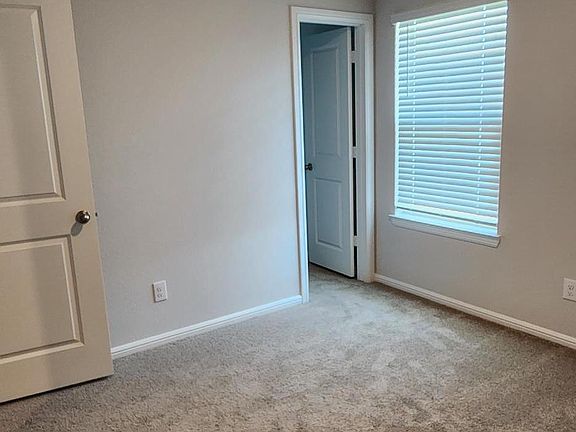Bedroom #2. Approx. 10x10, showing closet position on right and left is door into hallway