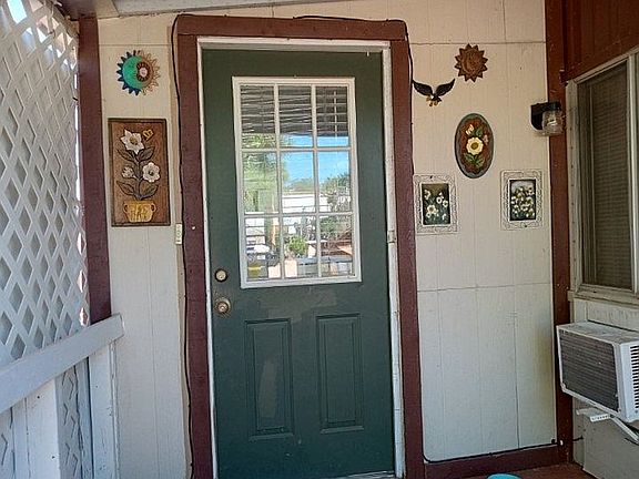 Front door sheltered by roof