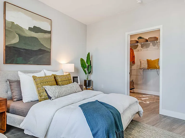 Bedrooms at The Wright feature modern finishes, spacious layouts, and walk-in closets designed for comfort, functionality, and everyday living.