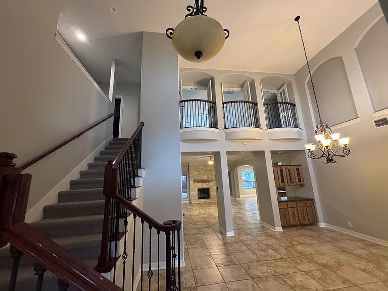 Large open foyer with juliet balconies