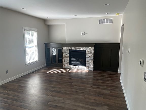Living room with gas fireplace.