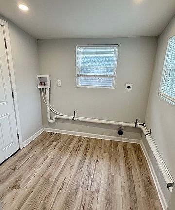 Laundry room with recessed lighting