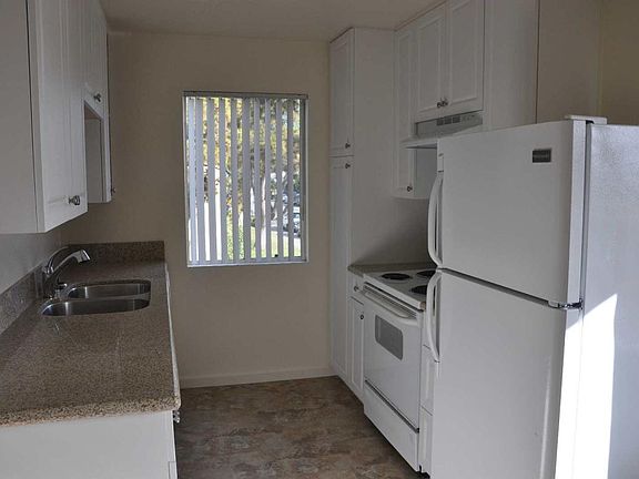 UPGRADED CABINETS & GRANITE COUNTERS. Counter depth floor to ceiling pantry cabinet!