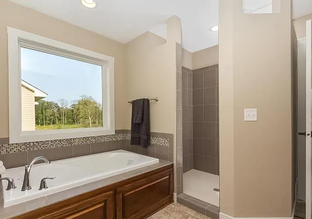 Bathroom with a lot of Morning Sunlight, Bath Tub and Standing Shower