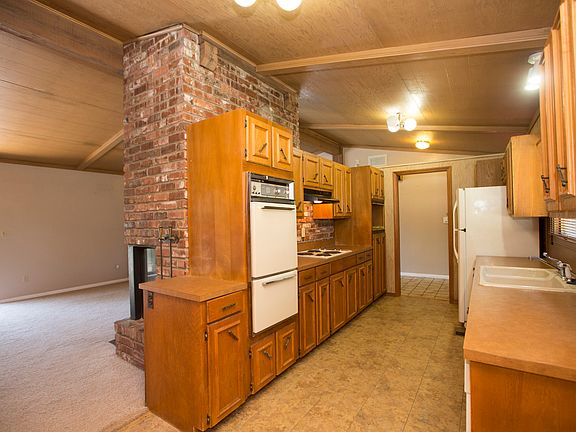 Unique brick wall leads to living