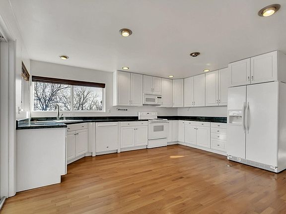 4th image of 3221 W 10th Ave Pl