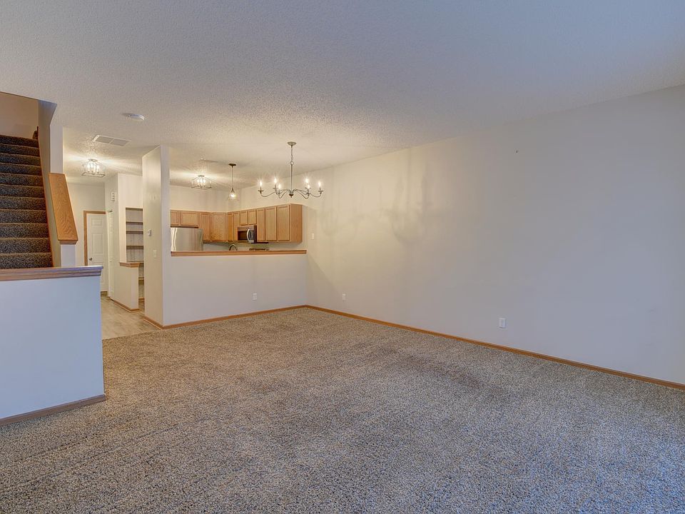 View of the open concept of the living room, the dining, and the kitchen.