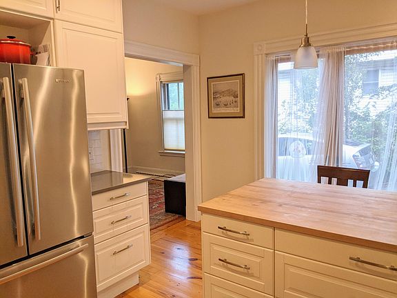 First Floor Kitchen: Natural light from French doors that open to the driveway and backyard