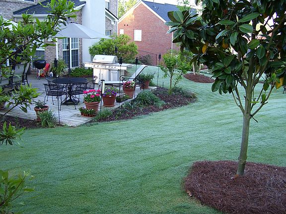 Ground level deck with afternoon shade