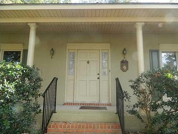 Greet your guest on the large covered front porch.