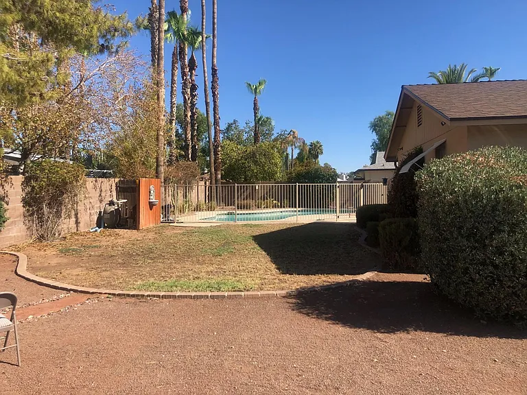 Large private backyard gets afternoon shade