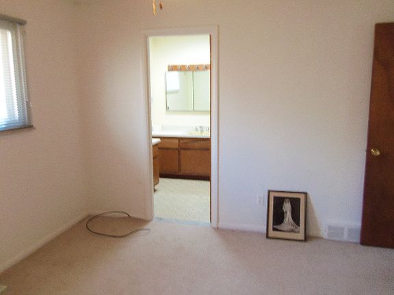 Bedroom with bath entrance
