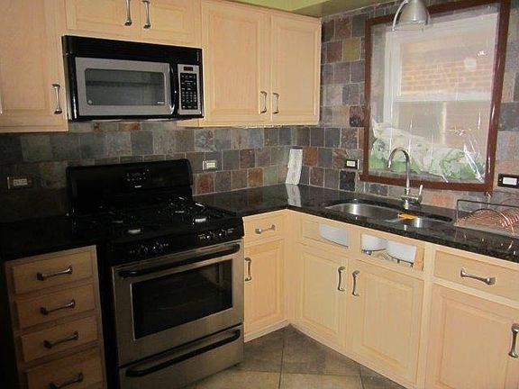 3rd image of 2020 N 73rd Ave APT 1E