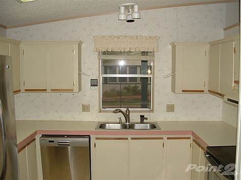 Sink Equipped with Instant Hot Water Tap