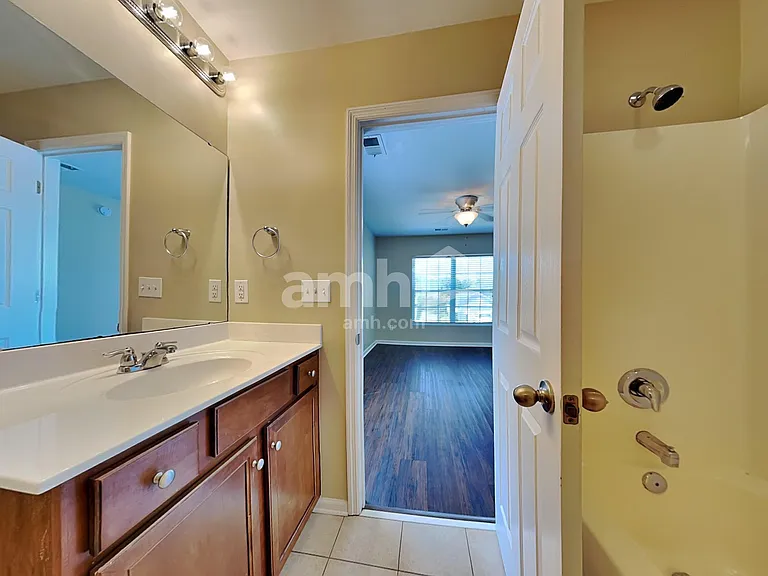 409 Lakewind Dr — Photo 12