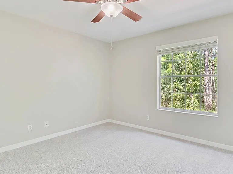 Our primary bedrooms include plush carpeting, ceiling fans, and plenty of space!