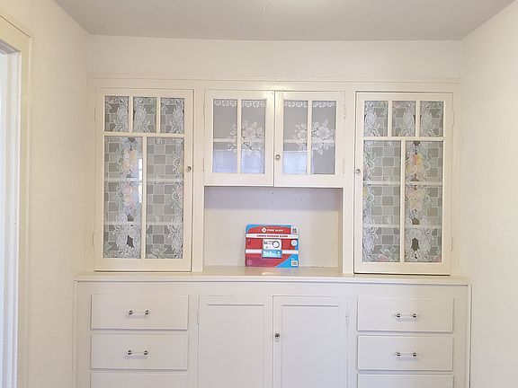 dining room with built in china cabinet